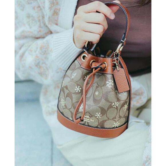 Coach CE587 Dempsey Drawstring Bucket Bag 15 With Snowflake Print Im/Khaki/Gold - Picture 9 of 9